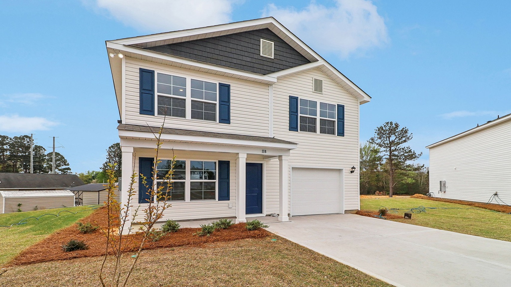 1-car garage with a large drive way