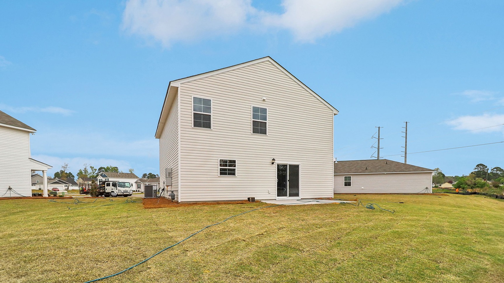 Spacious backyard and a paved back patio