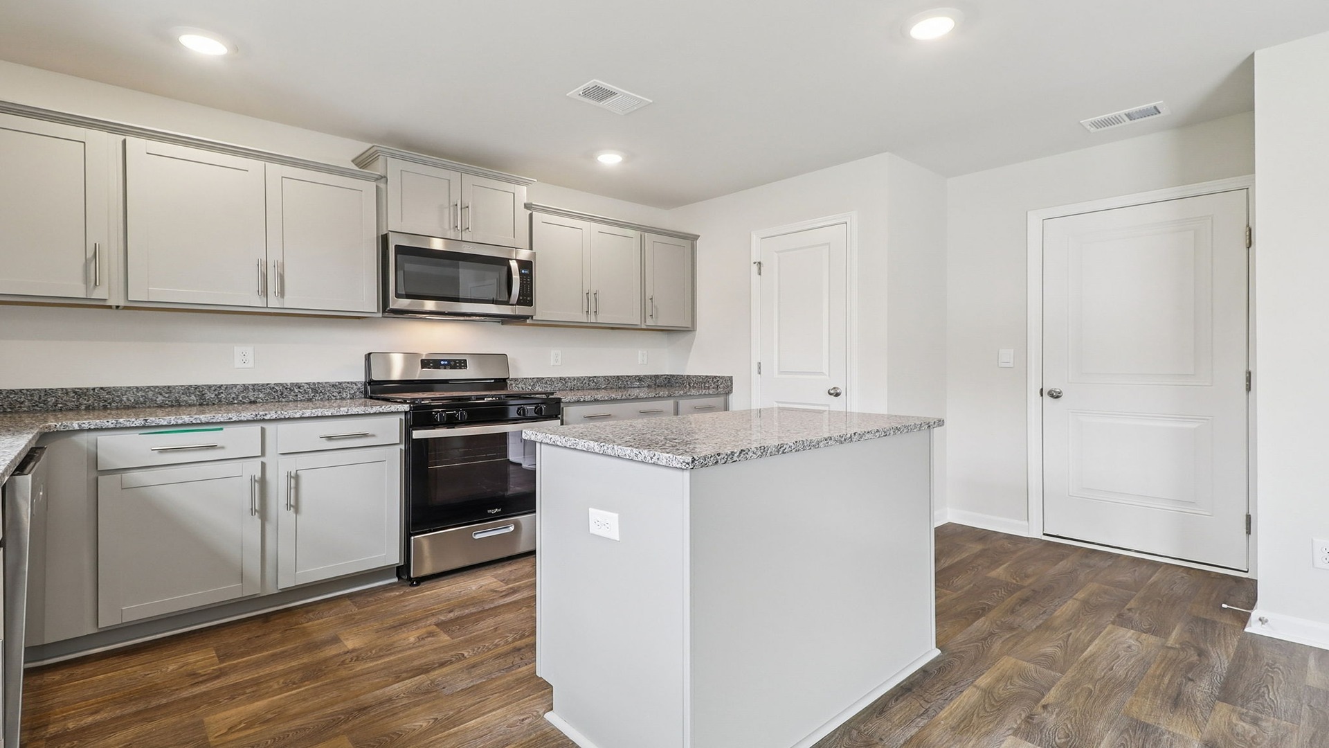 Floating island in the kitchen allows for extra cabinet and counter space in the Harrison kitchen