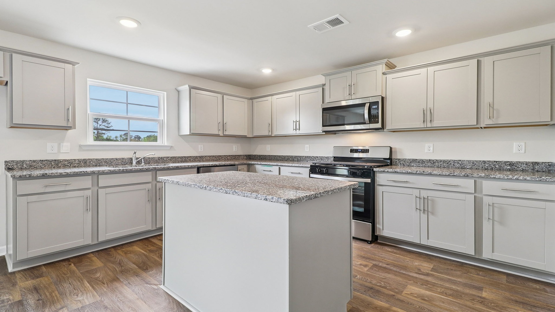 Window in the kitchen allows in natural light