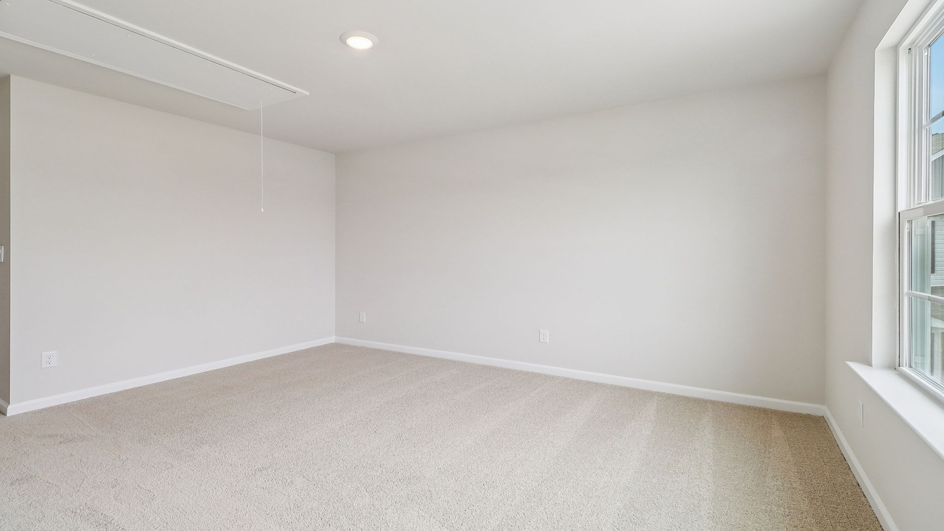Carpet flooring in bedroom 3 upstairs in the Harrison floorplan