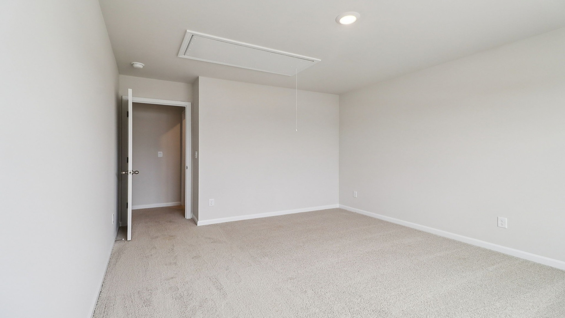 Carpet flooring in bedroom 3 upstairs in the Harrison floorplan