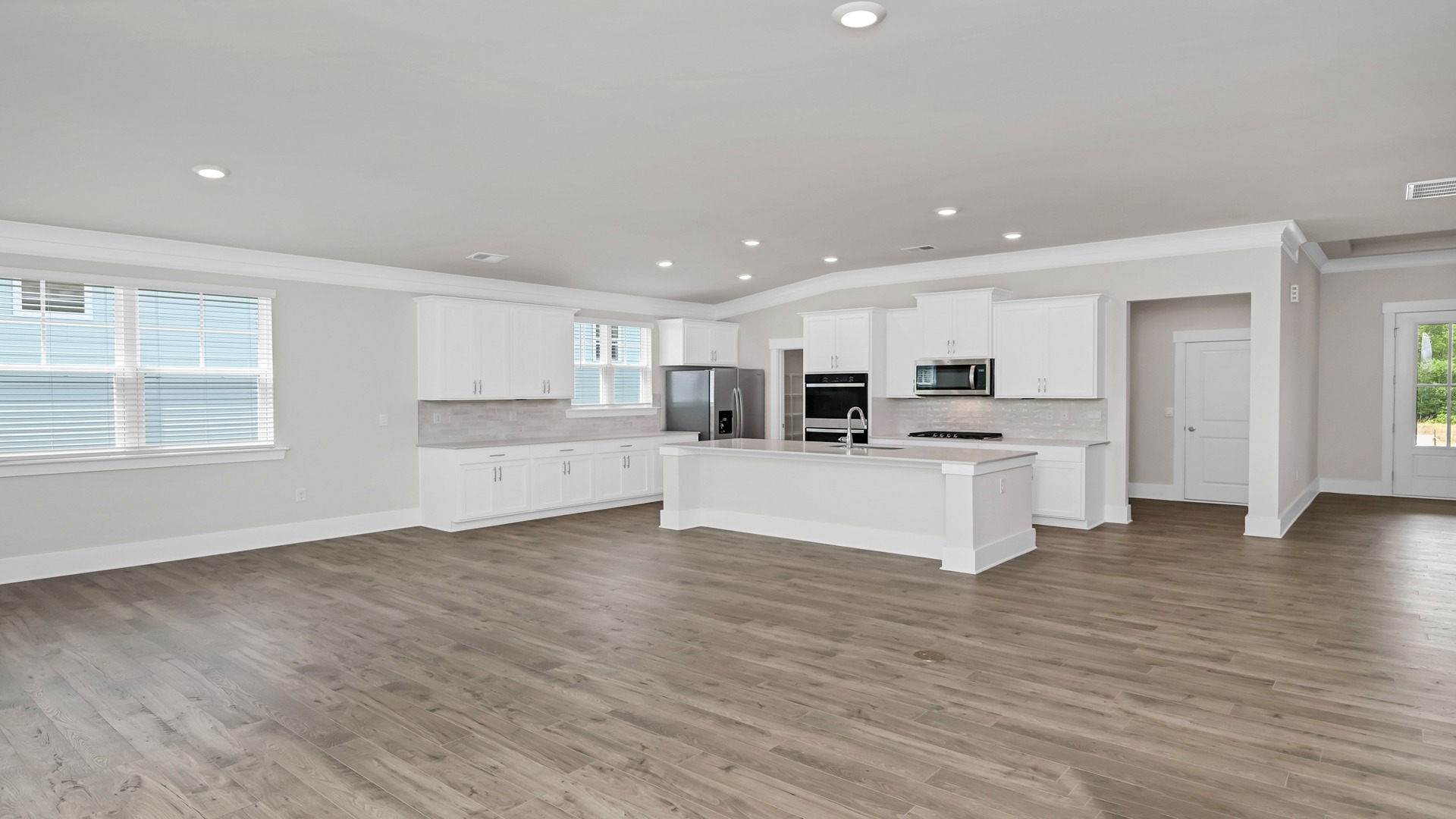 The kitchen and dining areas are open concept