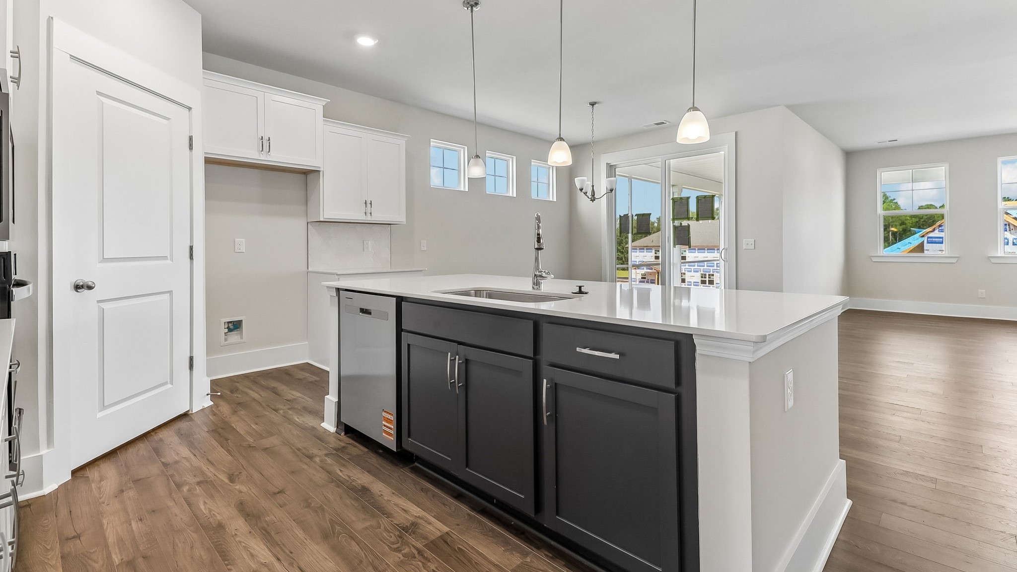 Color-pop cabinet color on floating island in Darby kitchen in Gilbert, SC
