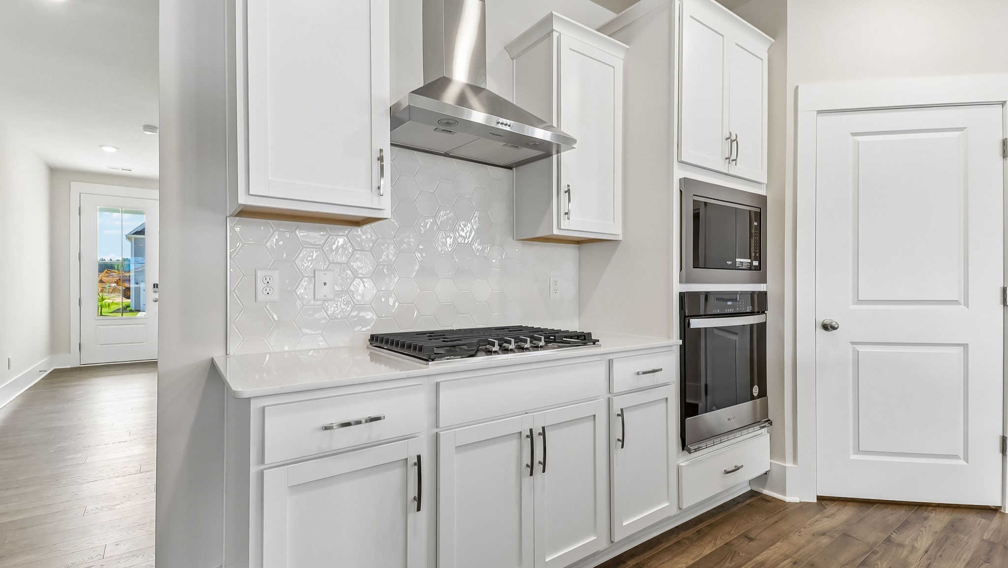 Darby kitchen with white cabinetry and quartz countertops