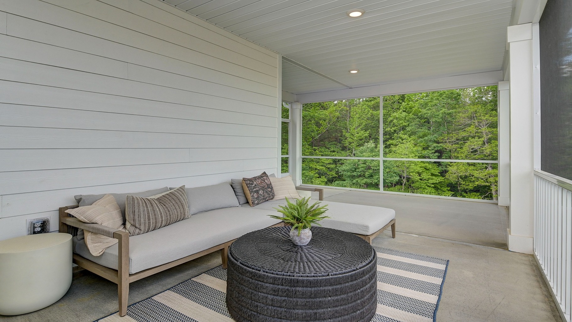 Extended covered, screened-in patio