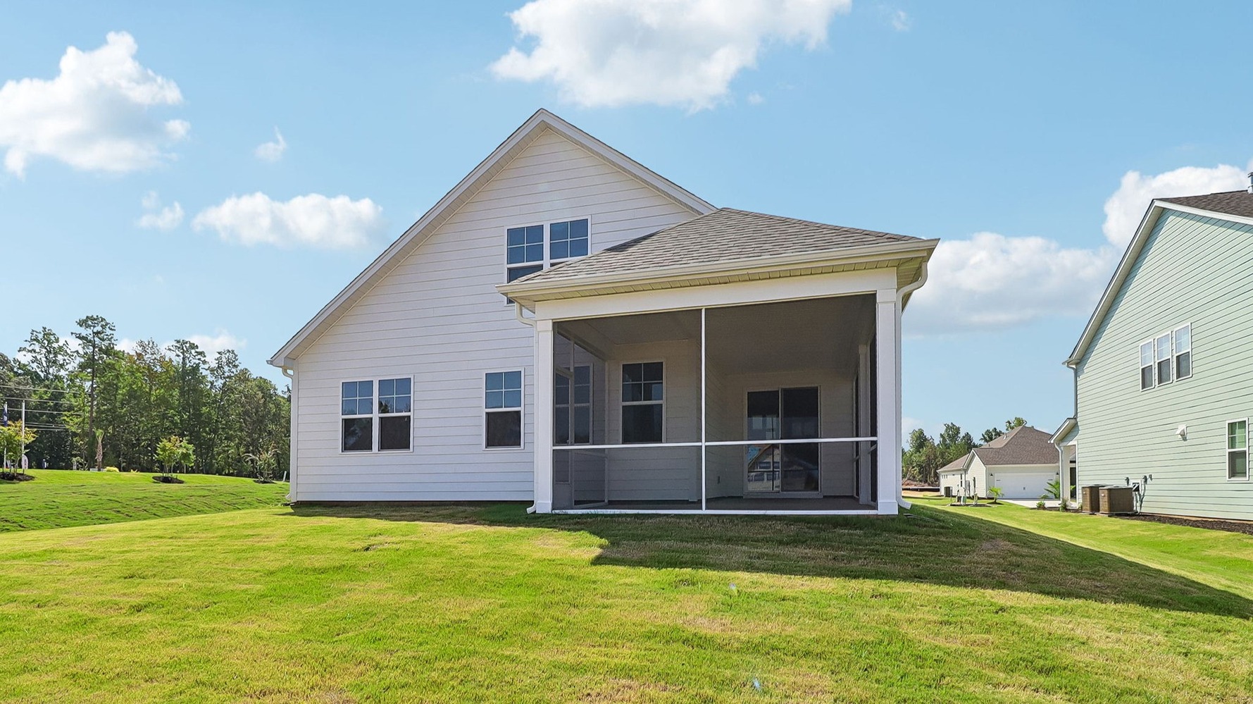 Spacious, sodded side and back yards