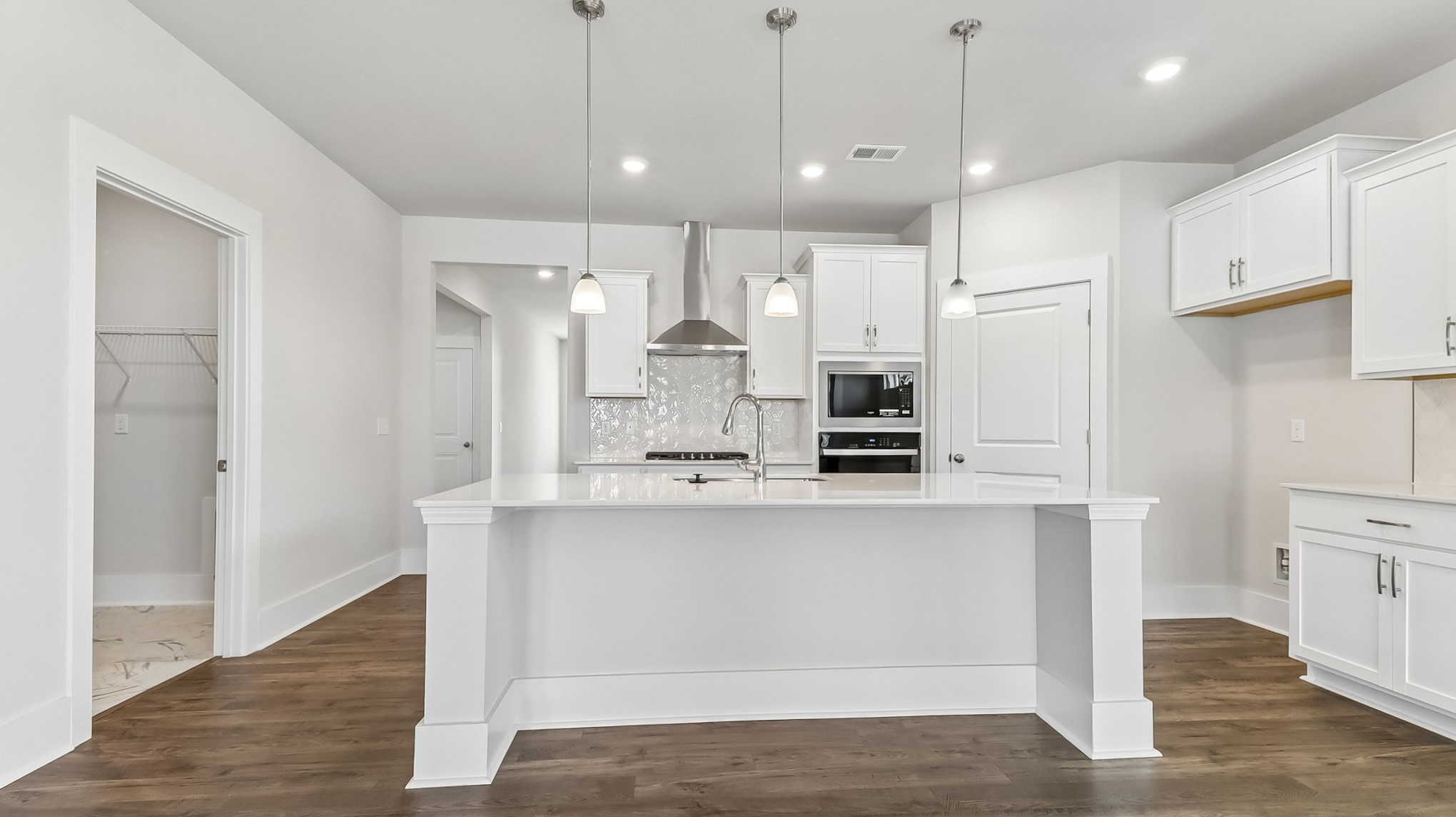 Space for barstool seating at floating kitchen island