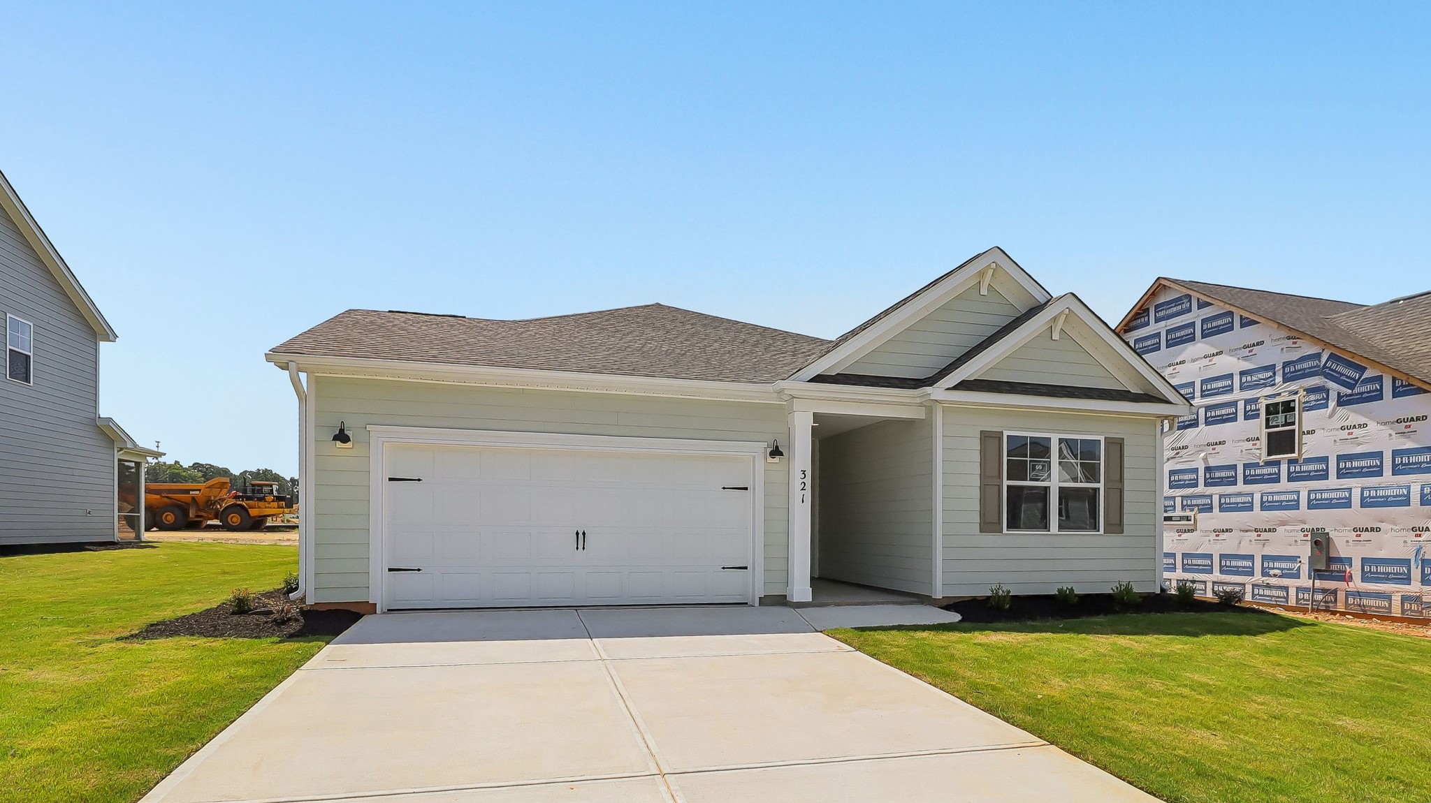 2-car garage and Hardie Plank siding on new home for sale in Gilbert, SC