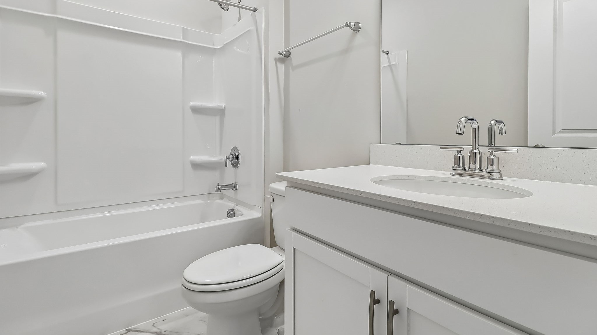 Bathroom 2 with a shower tub and a single vanity with quartz countertops