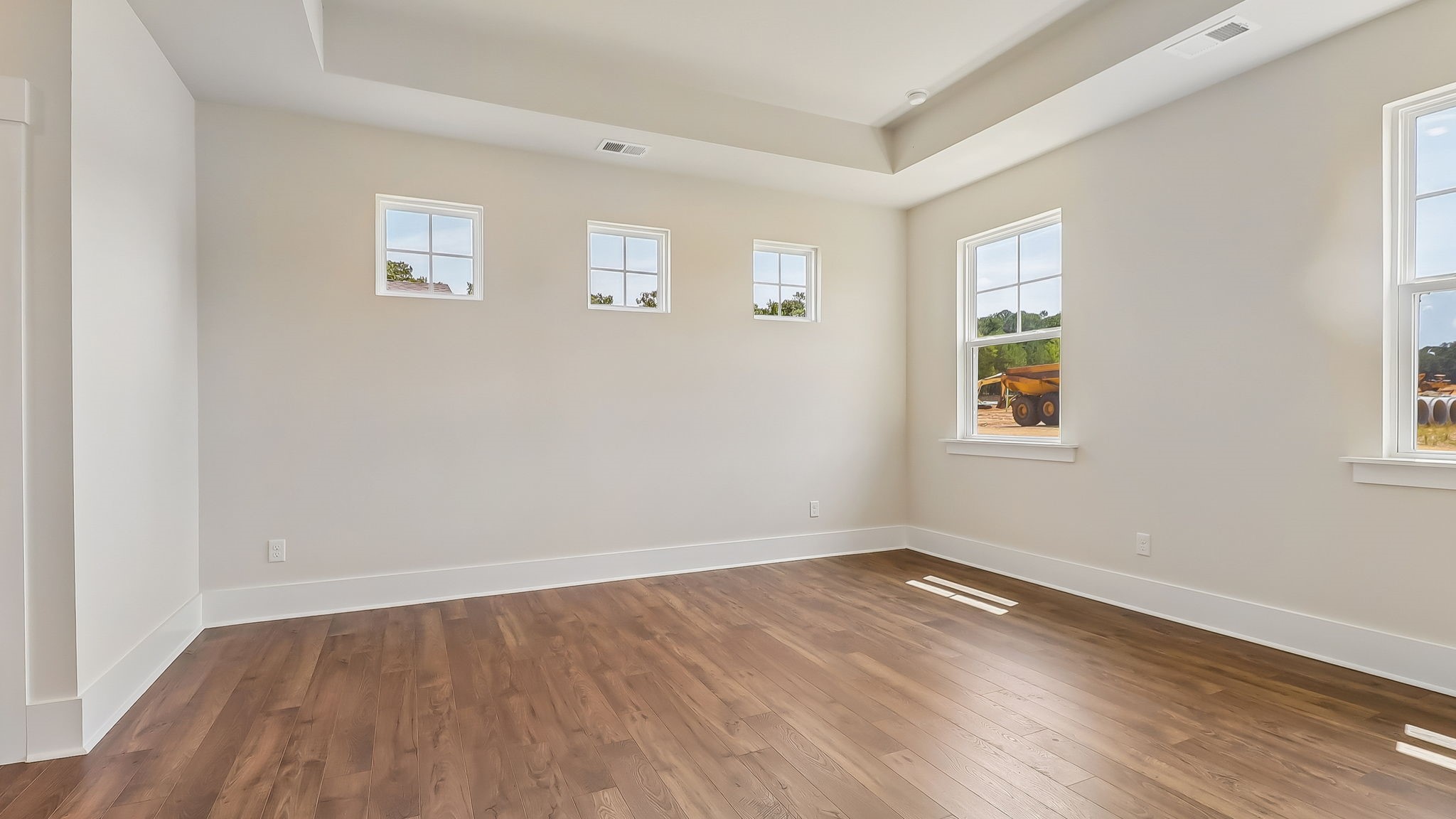 Primary bedroom privately tucked into the back of the home for sale in Shell Pointe