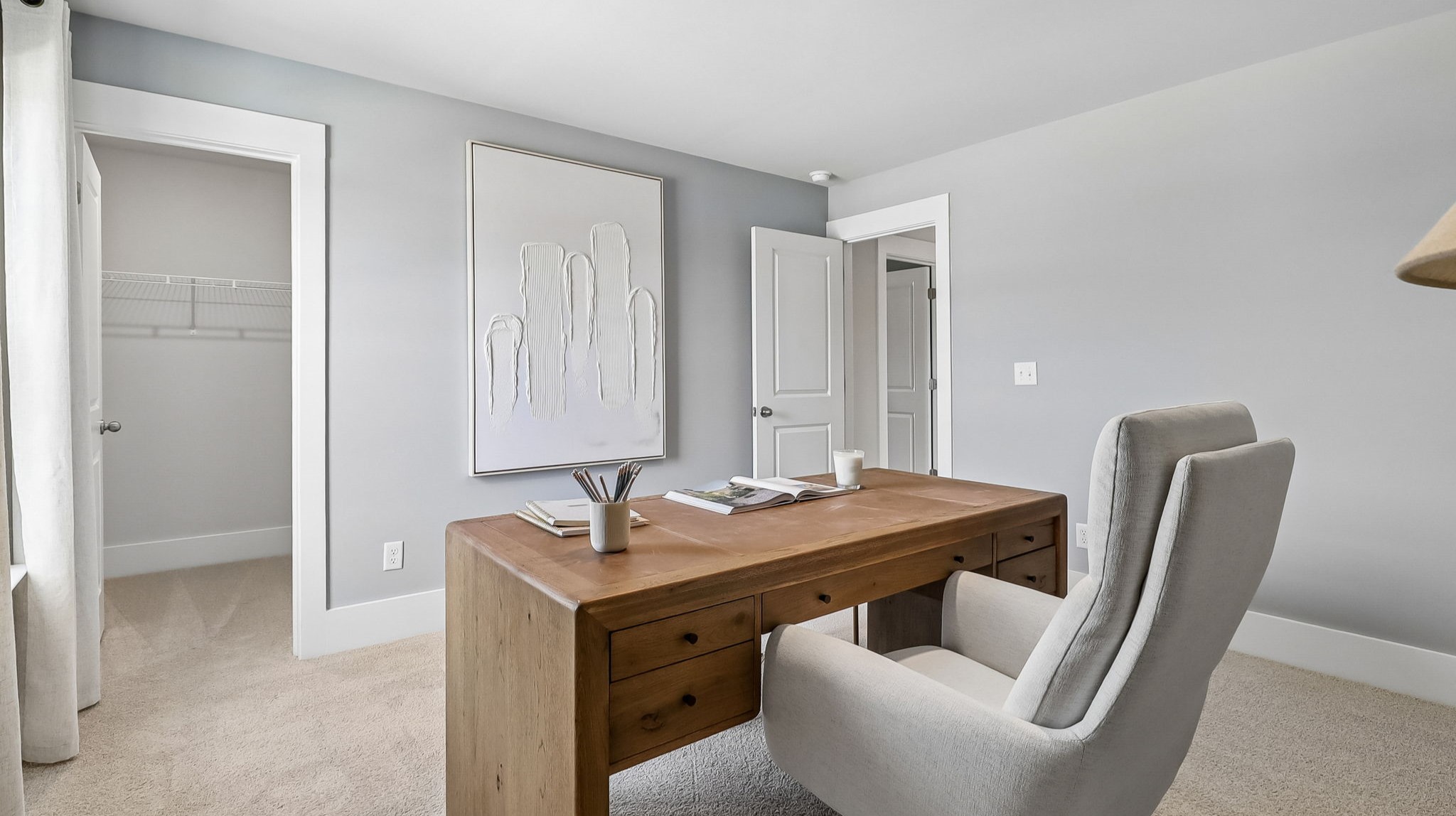 Walk-in, private closet in bedroom 5 upstairs that's staged as a home office
