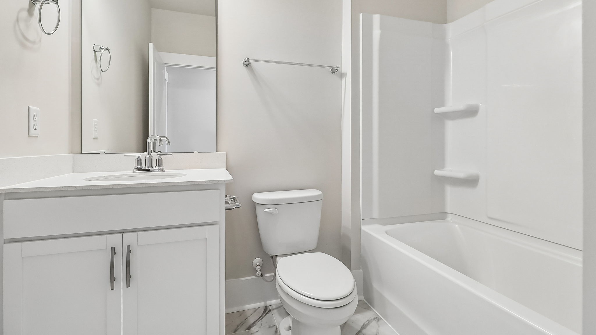 Bathroom 3 towards the front of the new construction home with a single vanity and shower tub combo