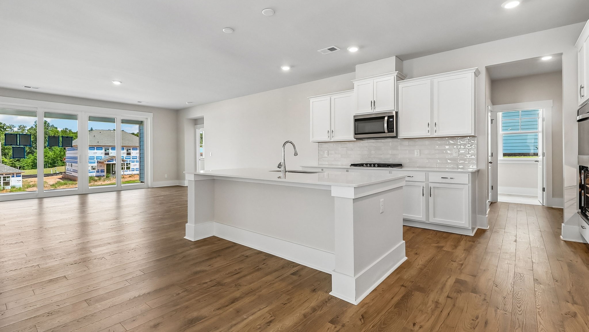 Front foyer opens up into the Trivecta kitchen space
