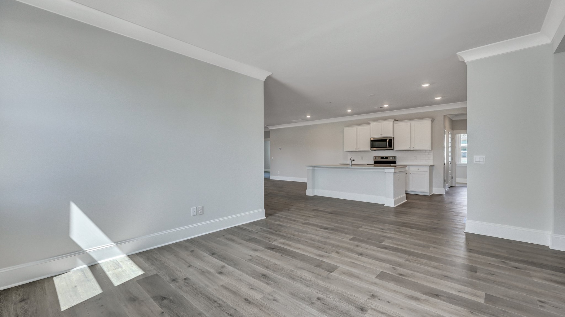 Dining area in Trivecta for sale in Shell Pointe has views of the modern kitchen space
