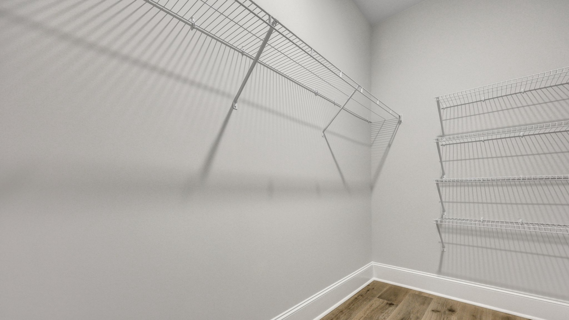 Two large, walk-in primary his & her closets in home for sale near Lake Murray