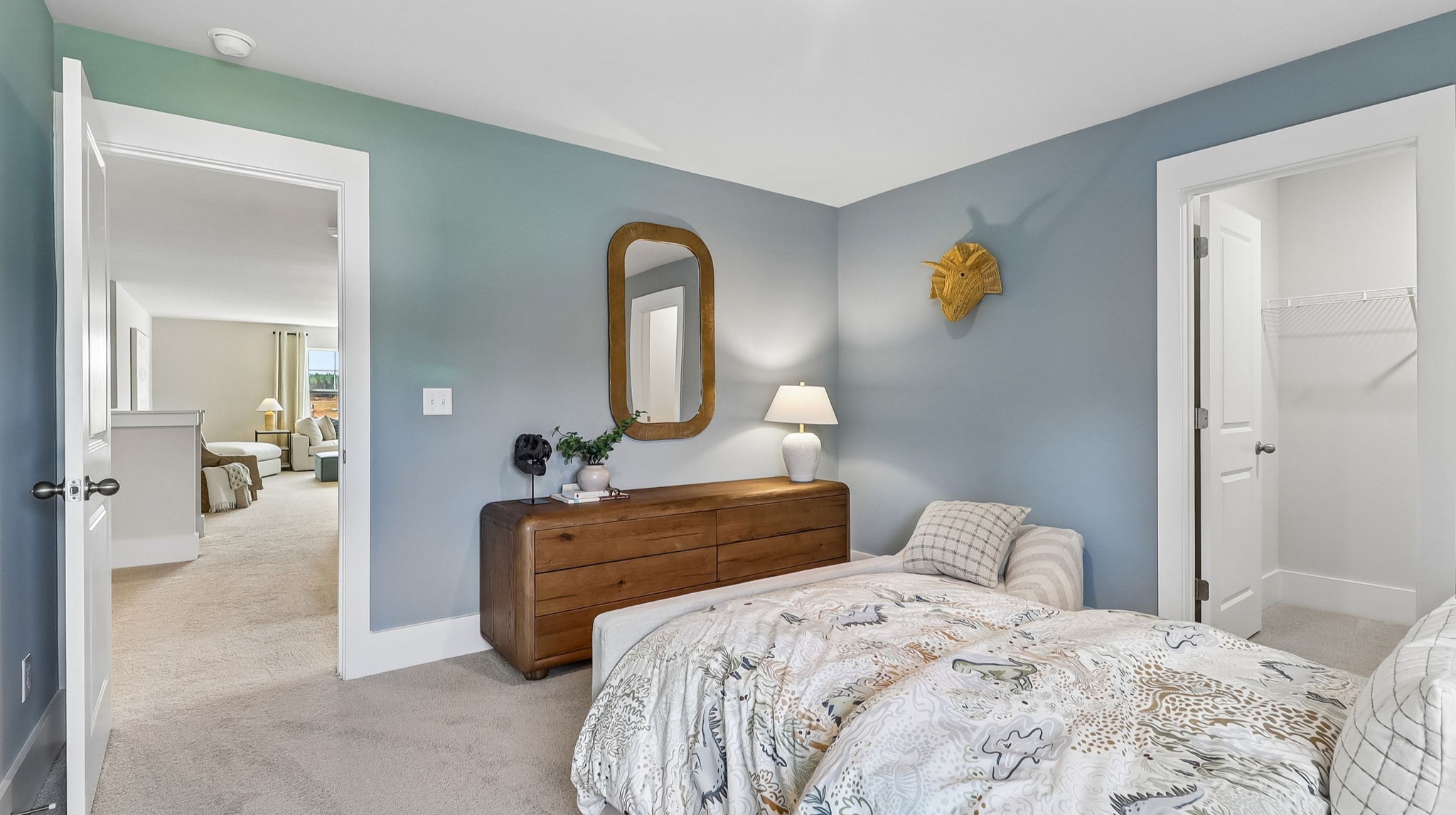 Walk-in primary closet in bedroom 4 upstairs in new construction home in Gilbert, SC
