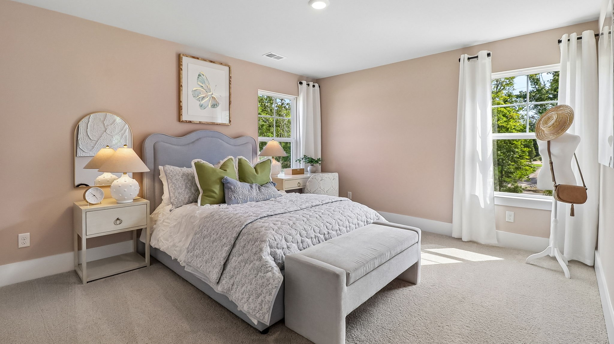 Bedroom 3 upstairs with two windows for light and carpet floors