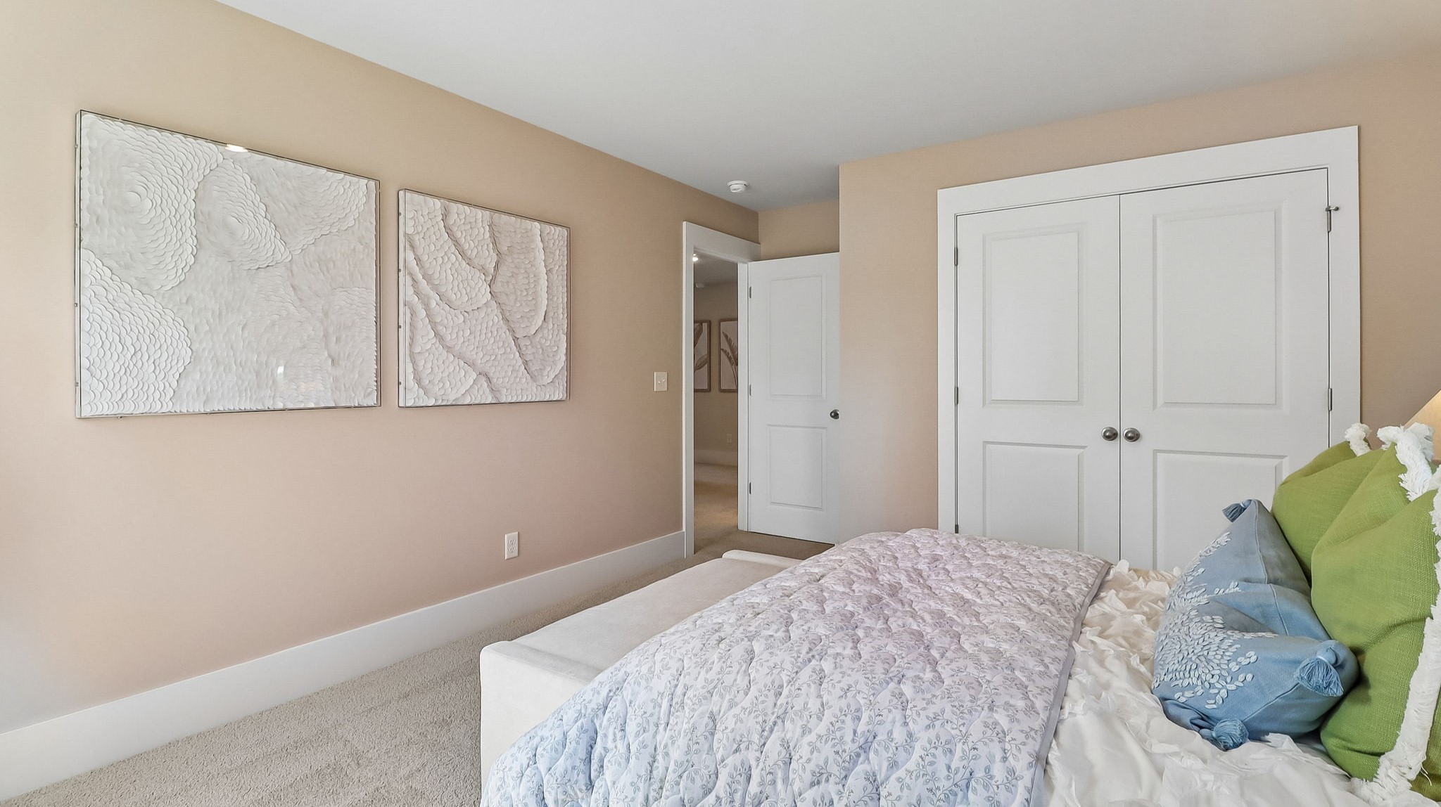 French closet doors in bedroom 3 of the Tillman model home in Shell Pointe
