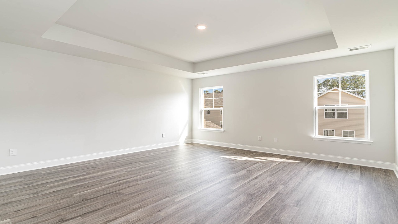 Large primary bedroom with sitting room upstairs in the Forrester Floorplan