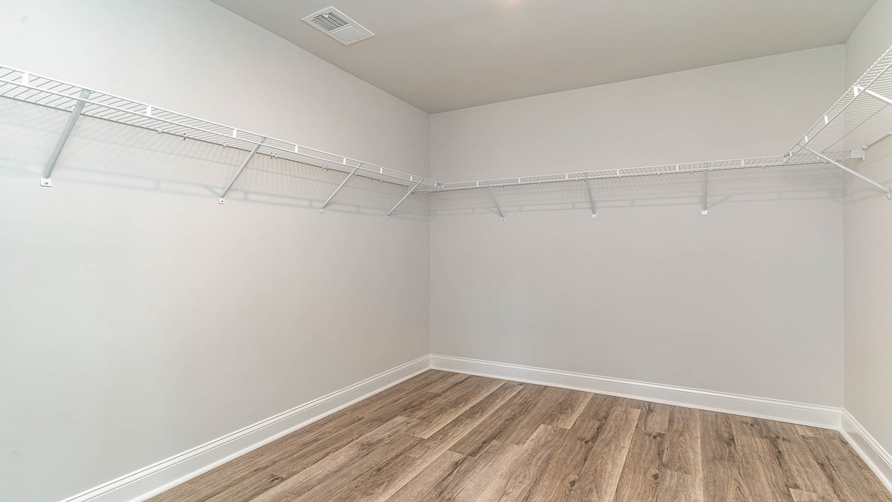 Large walk-in primary closet in new construction home for sale in Gilbert, SC