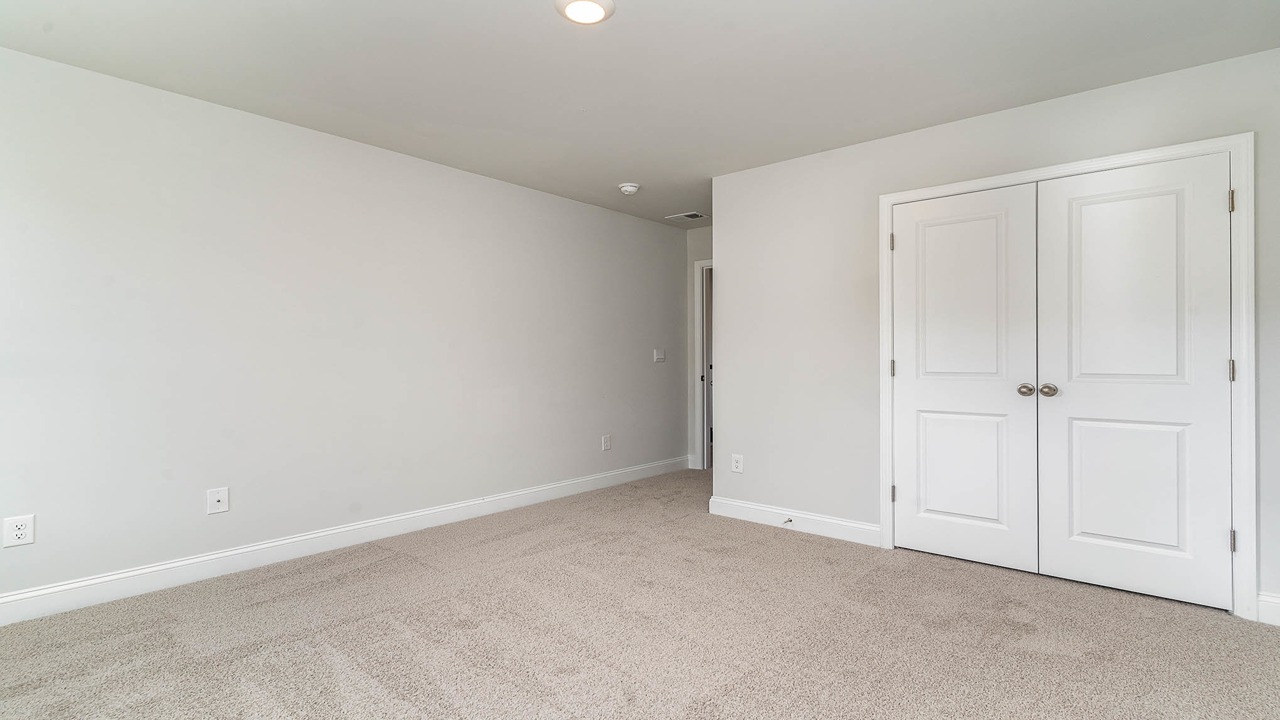 Carpet flooring in all bedrooms of the Forrester for sale near Lake Murray in Gilbert, SC