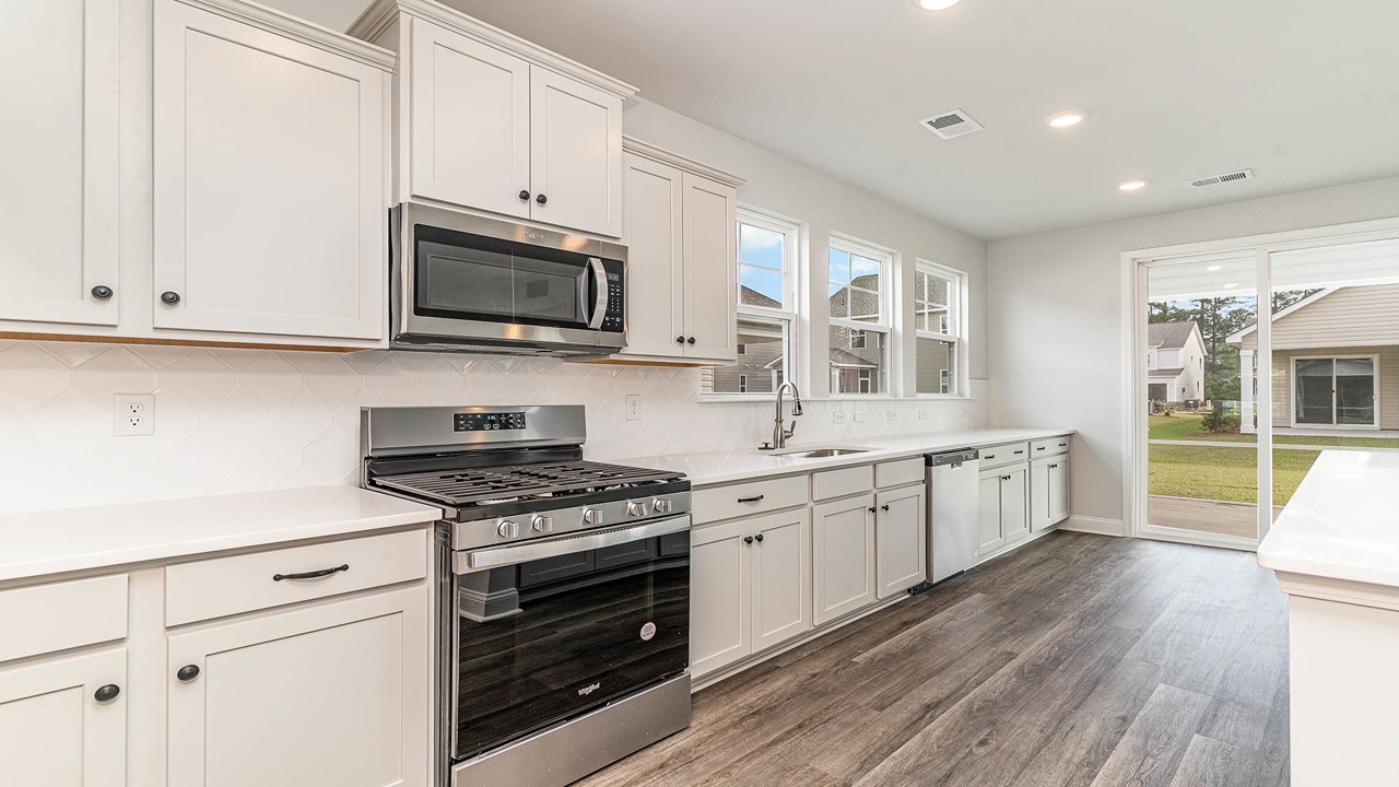 New stainless-steel appliances come with the kitchen in new home for sale in Gilbert, SC