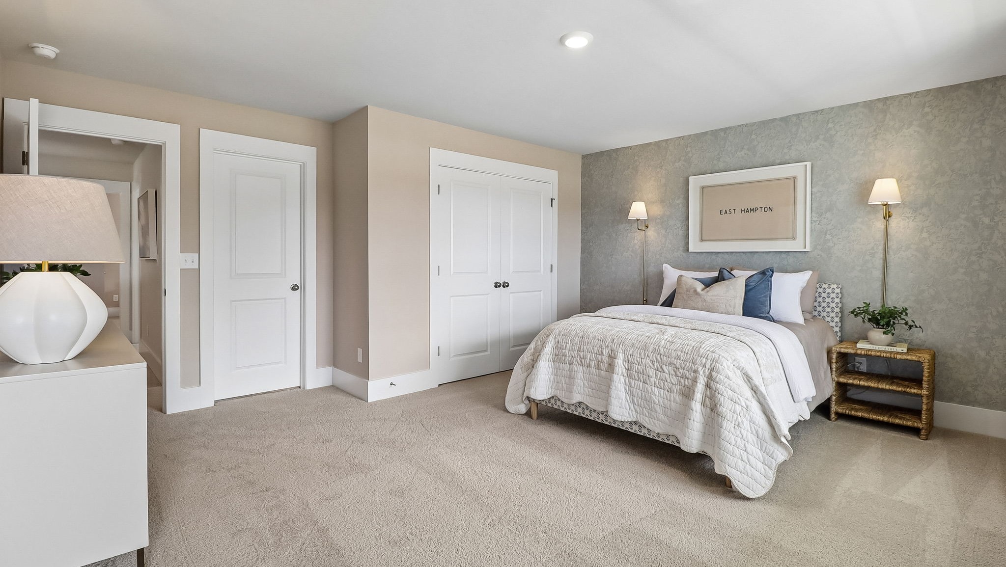 French closet doors in bedroom 2 upstairs in the Tillman model home