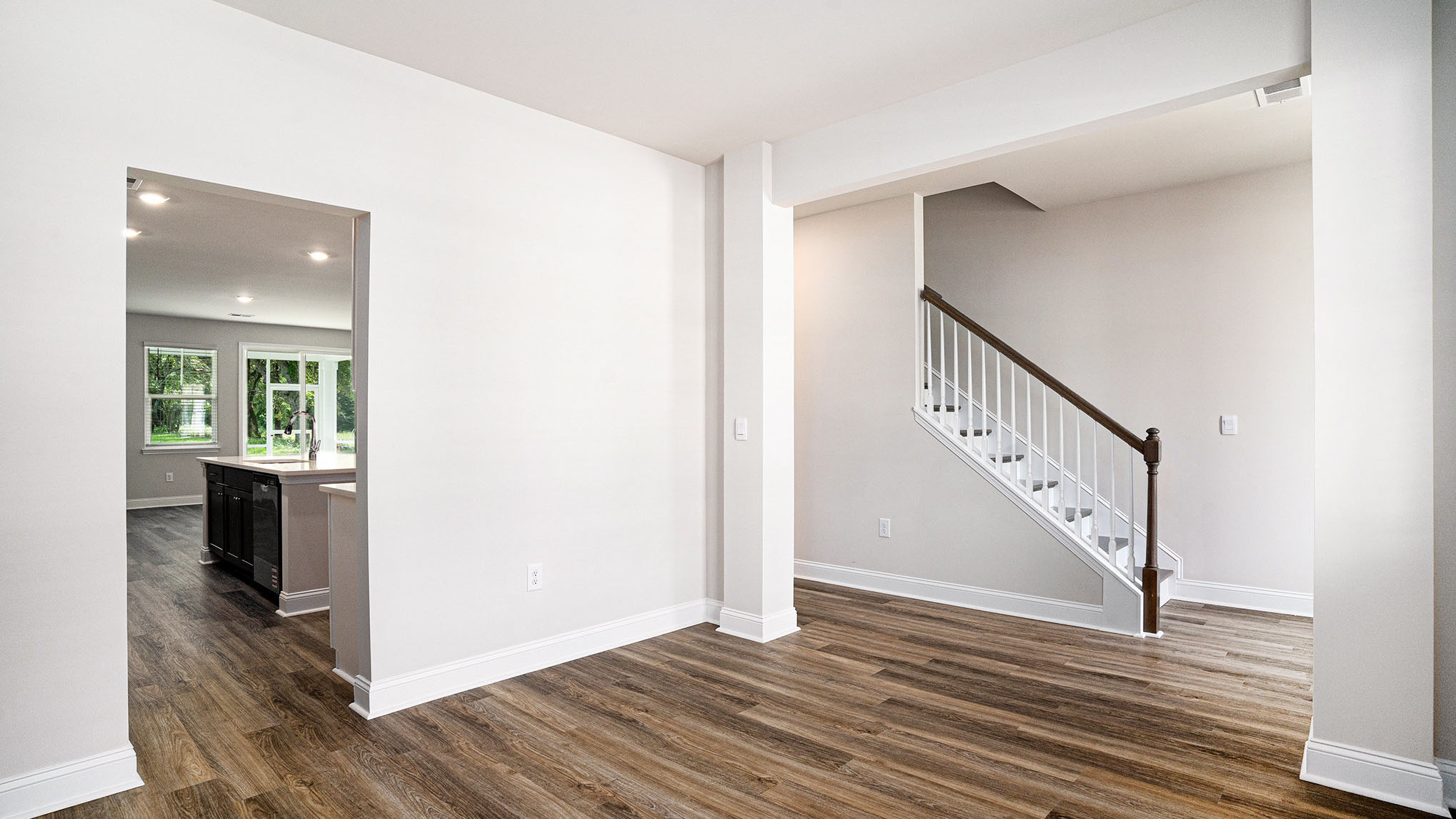 Dining area off front foyer with access to kitchen space