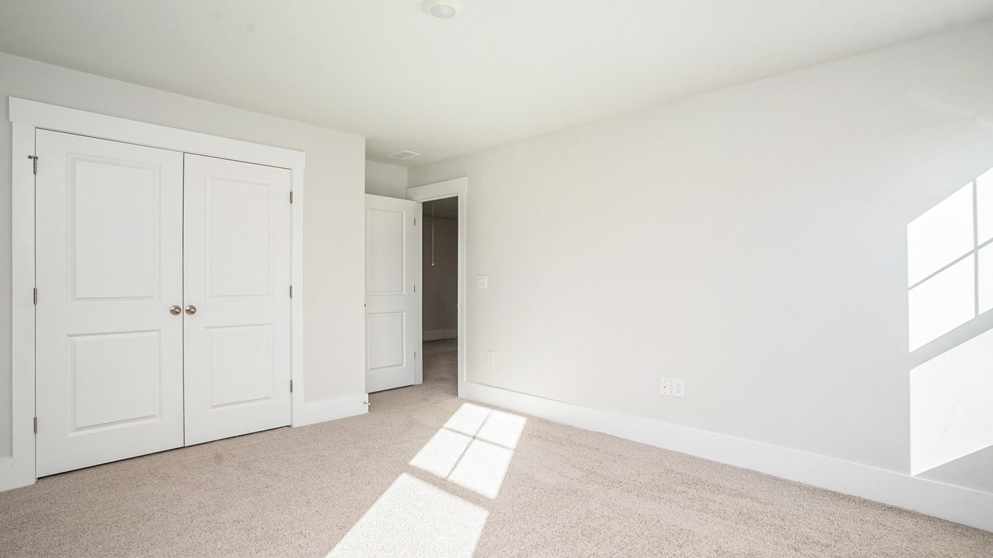 Bedroom 3 with French closet doors