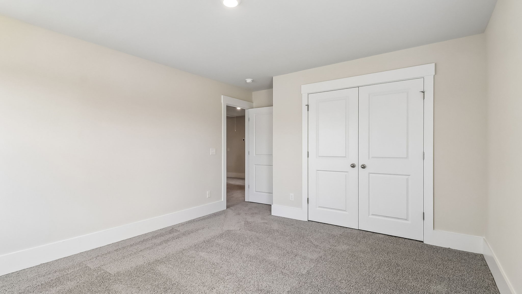 Bedroom 3 with French closet doors