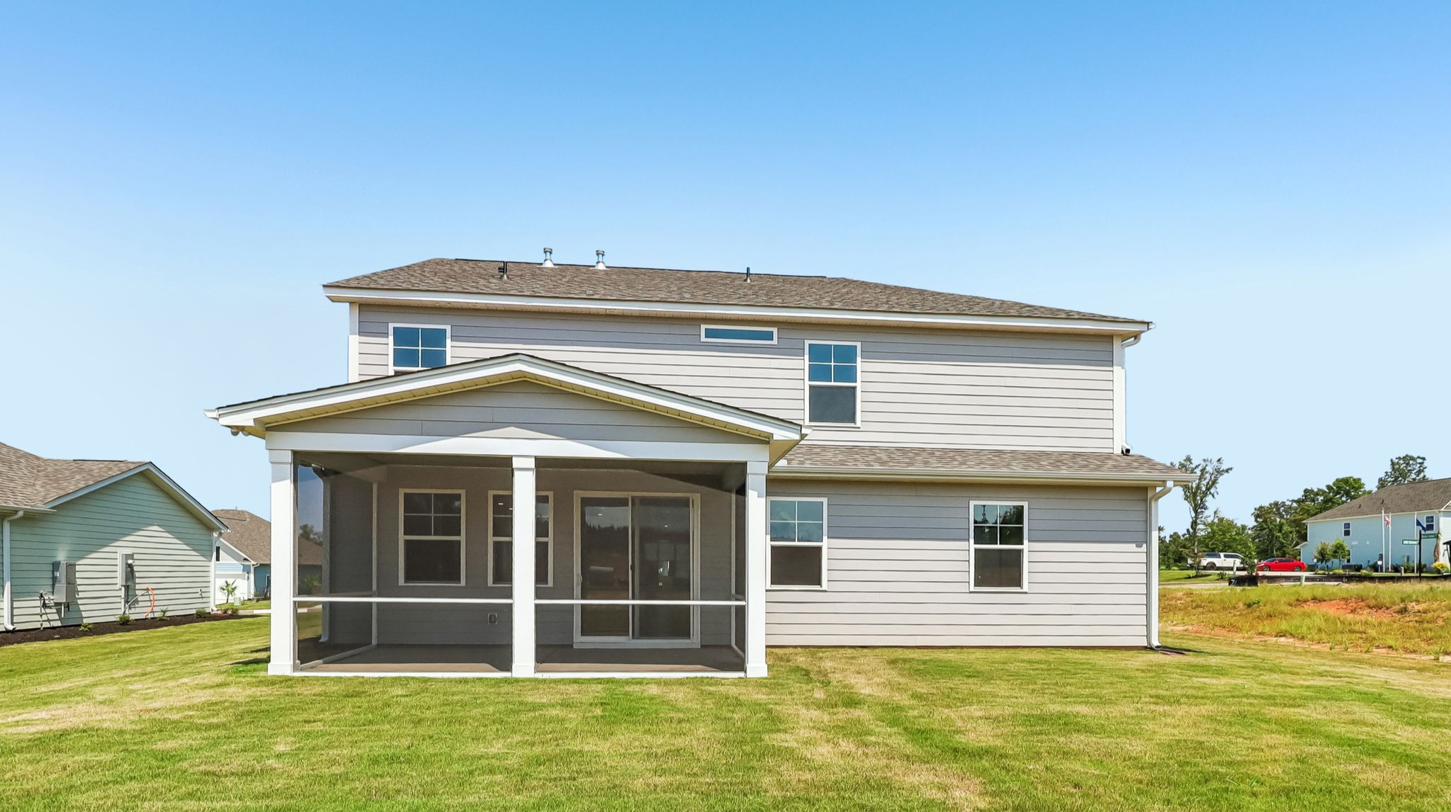 Durable Hardie Plank finishes the exterior of the two-story home