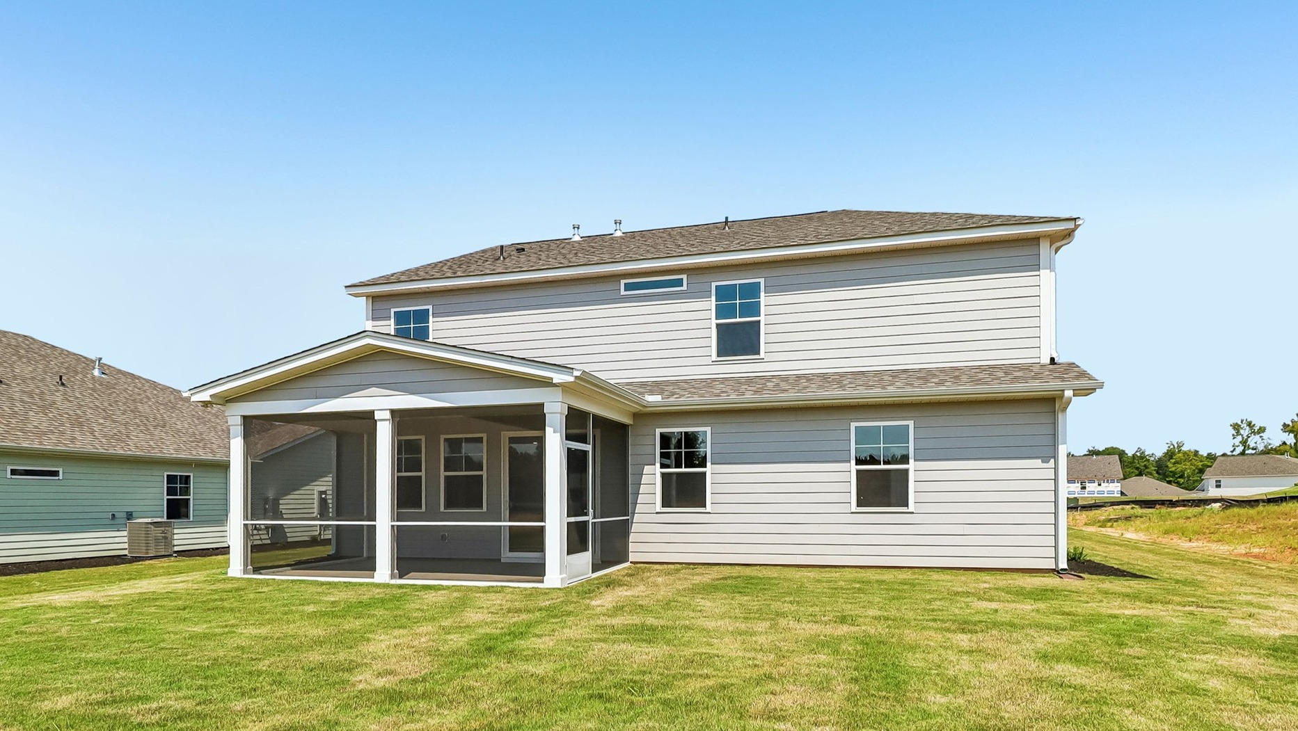 Spacious, sodded yards finish the large homesite in Shell Pointe community