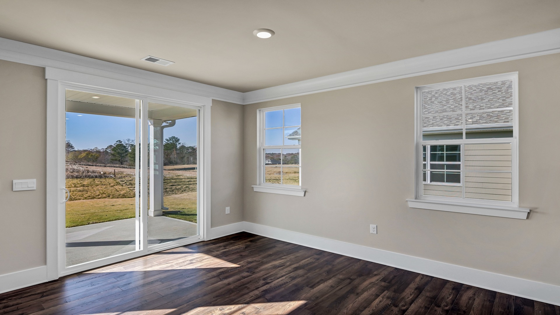 Dining area with sliding glass doors leading to back patio