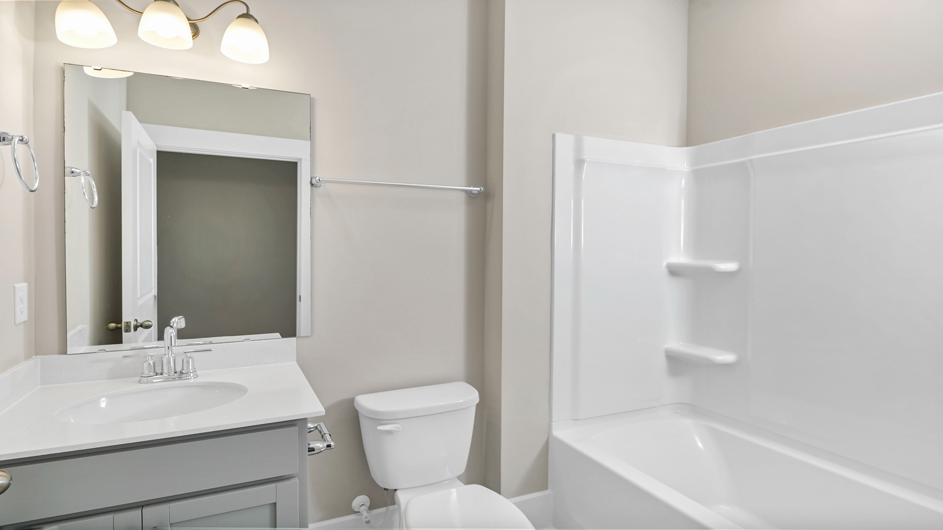 Bathroom 2 is downstairs with a shower/tub combo