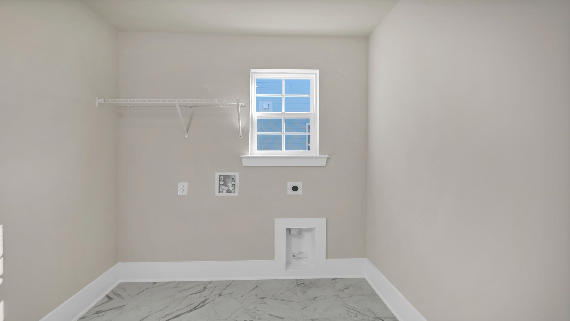Laundry room located upstairs