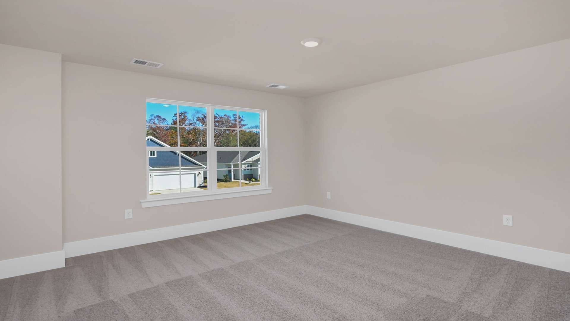 Bedroom 2 upstairs with carpet flooring and natural light
