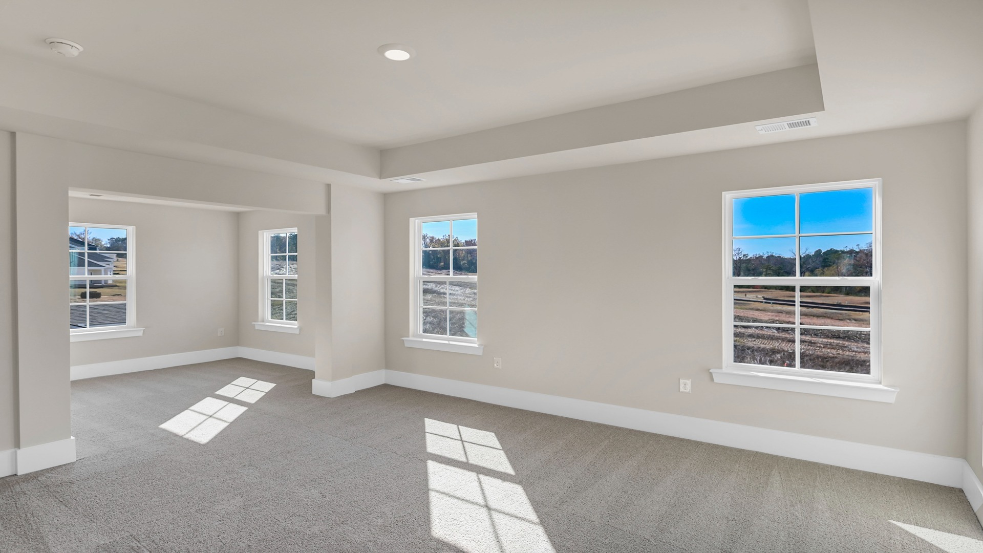Spacious primary bedroom upstairs