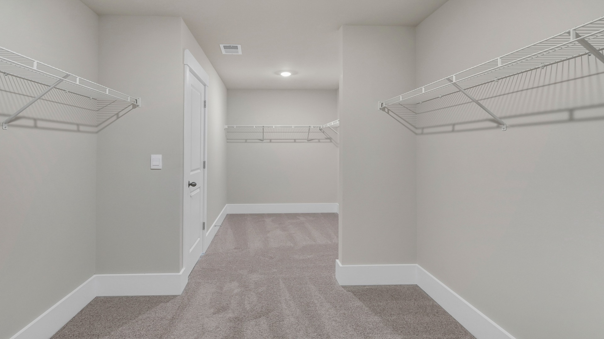 Very large walk-in primary closet