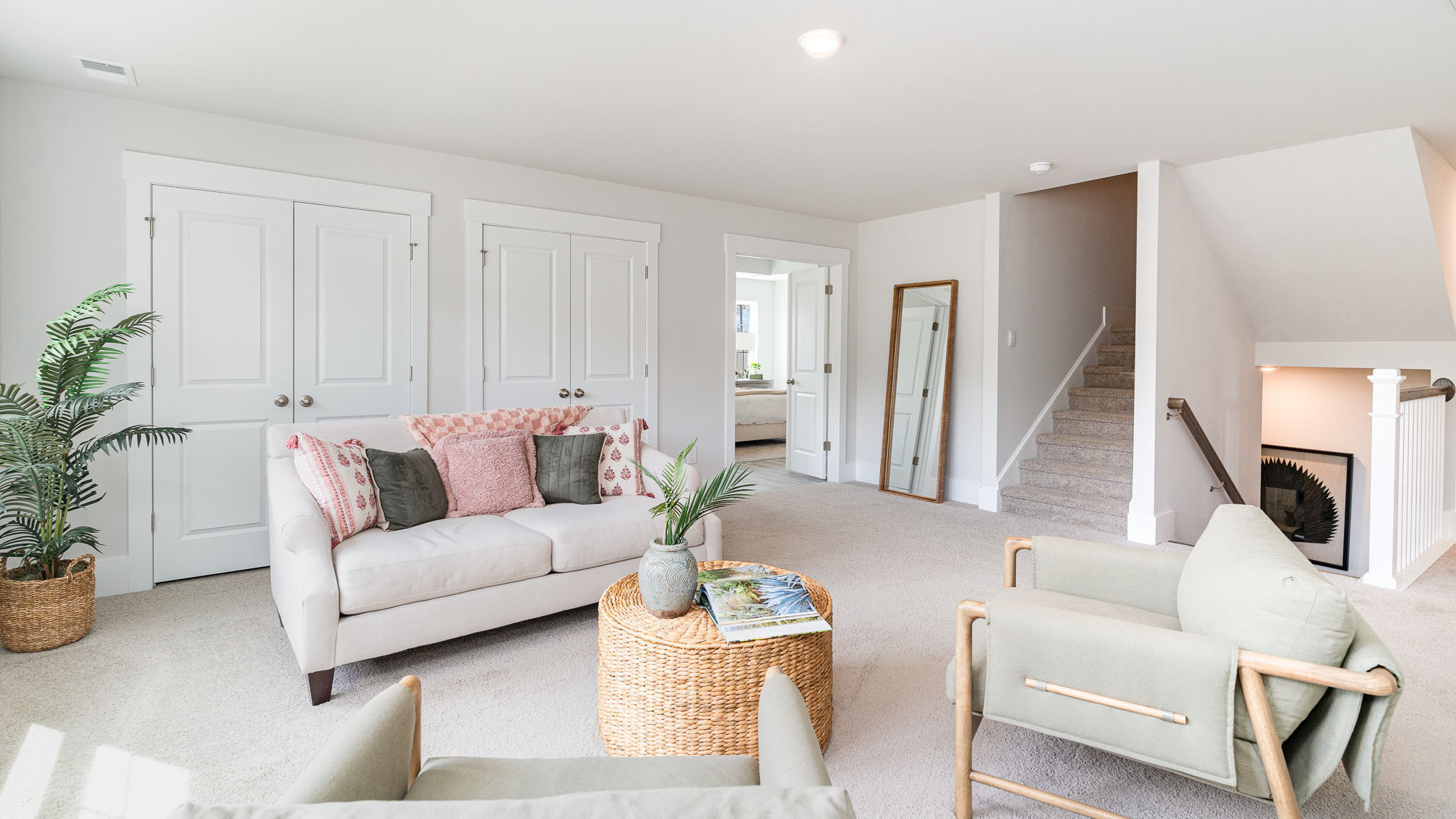 The upstairs loft is staged as a secondary living space