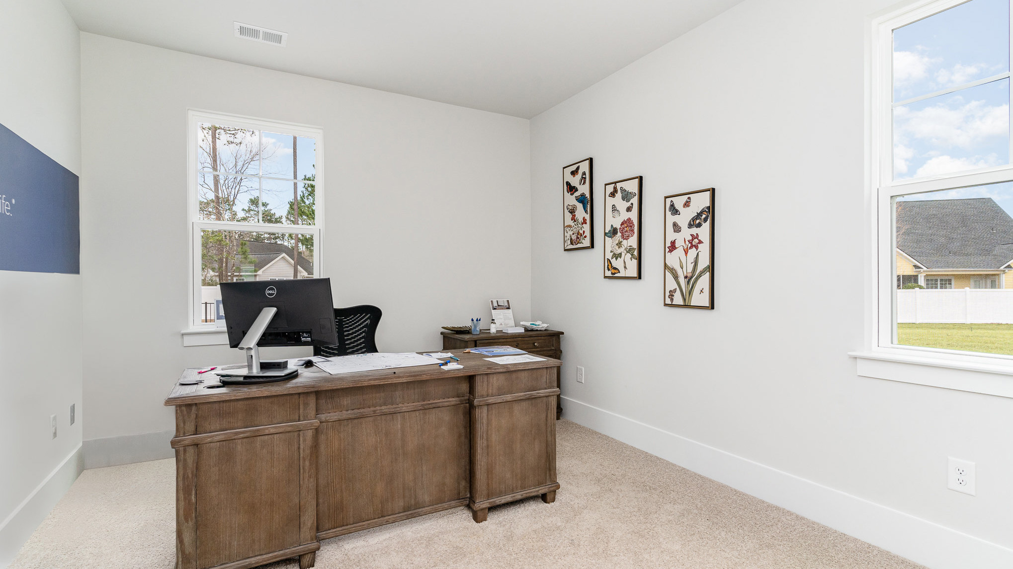 Bedroom 4 is downstairs and is staged as a home office