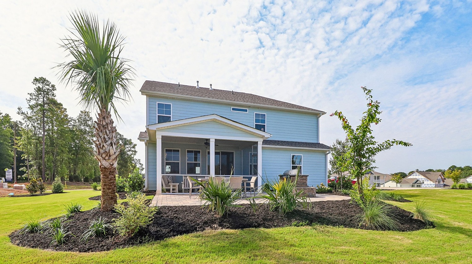 Spacious back and side yards in Shell Pointe with inspiration for landscaping at the model home