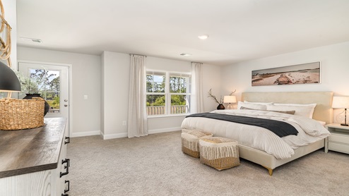 Spacious bedroom 2 upstairs with access to upstairs porch/balcony