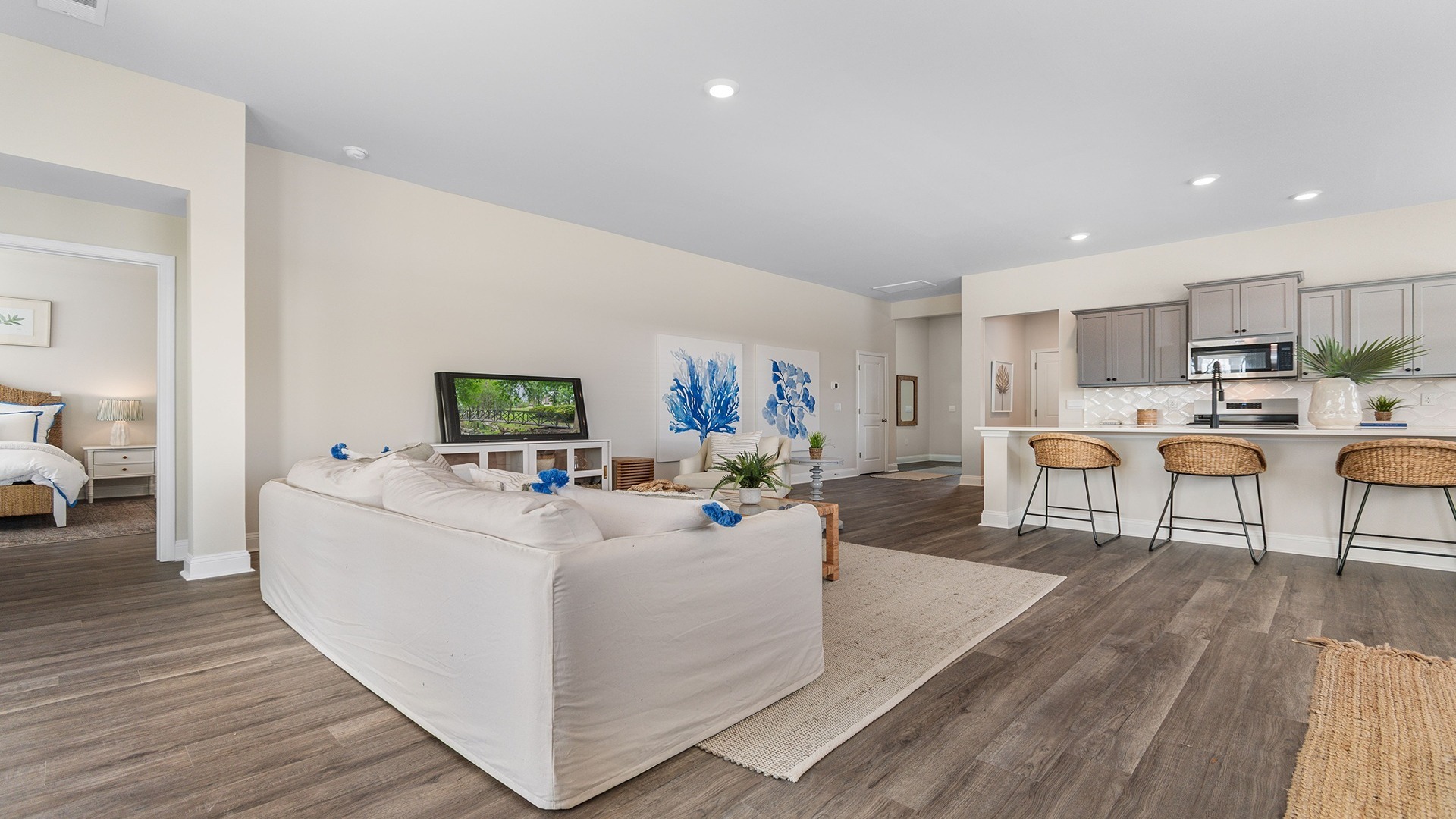 Living area leads into private primary suite at back of home Lexington, SC