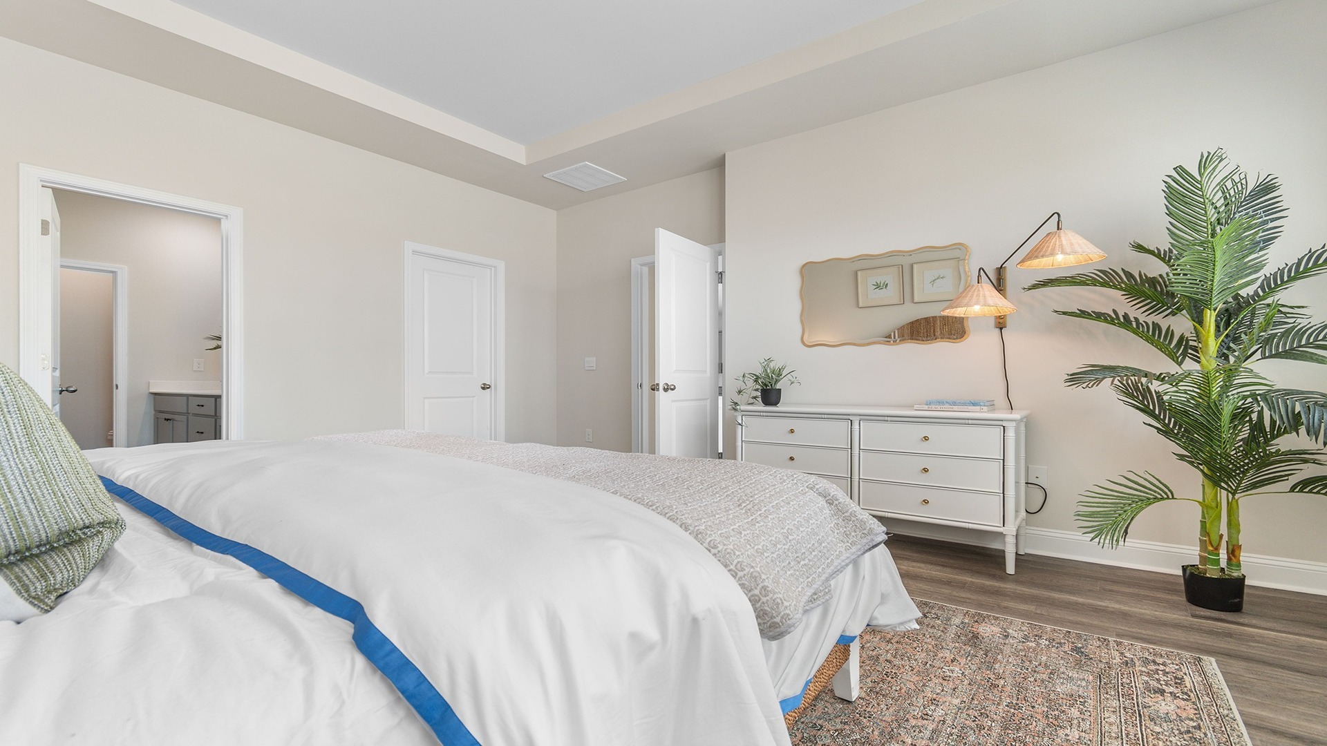 Primary suite comfortably fits a king or queen bed