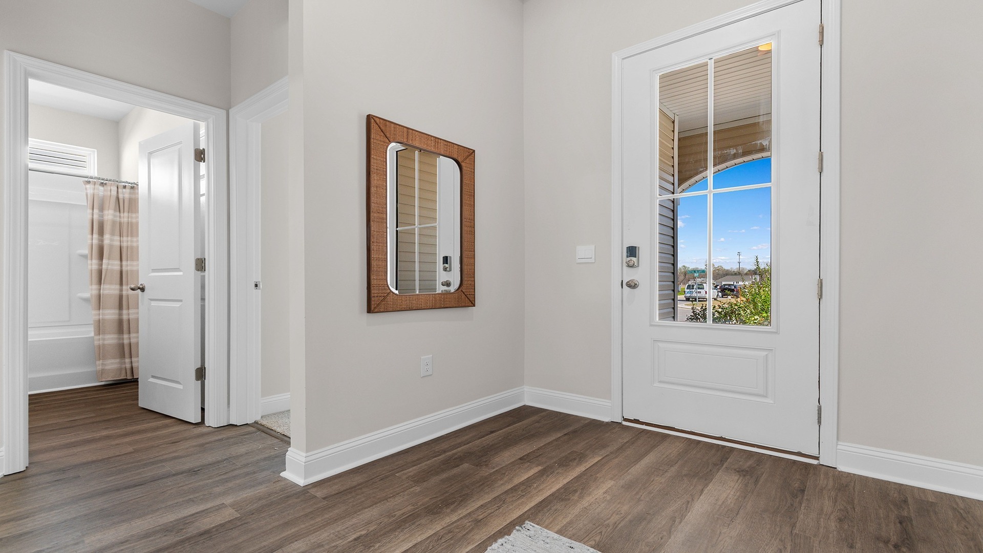 End up back at the front foyer of the Eaton with a glass panel front door
