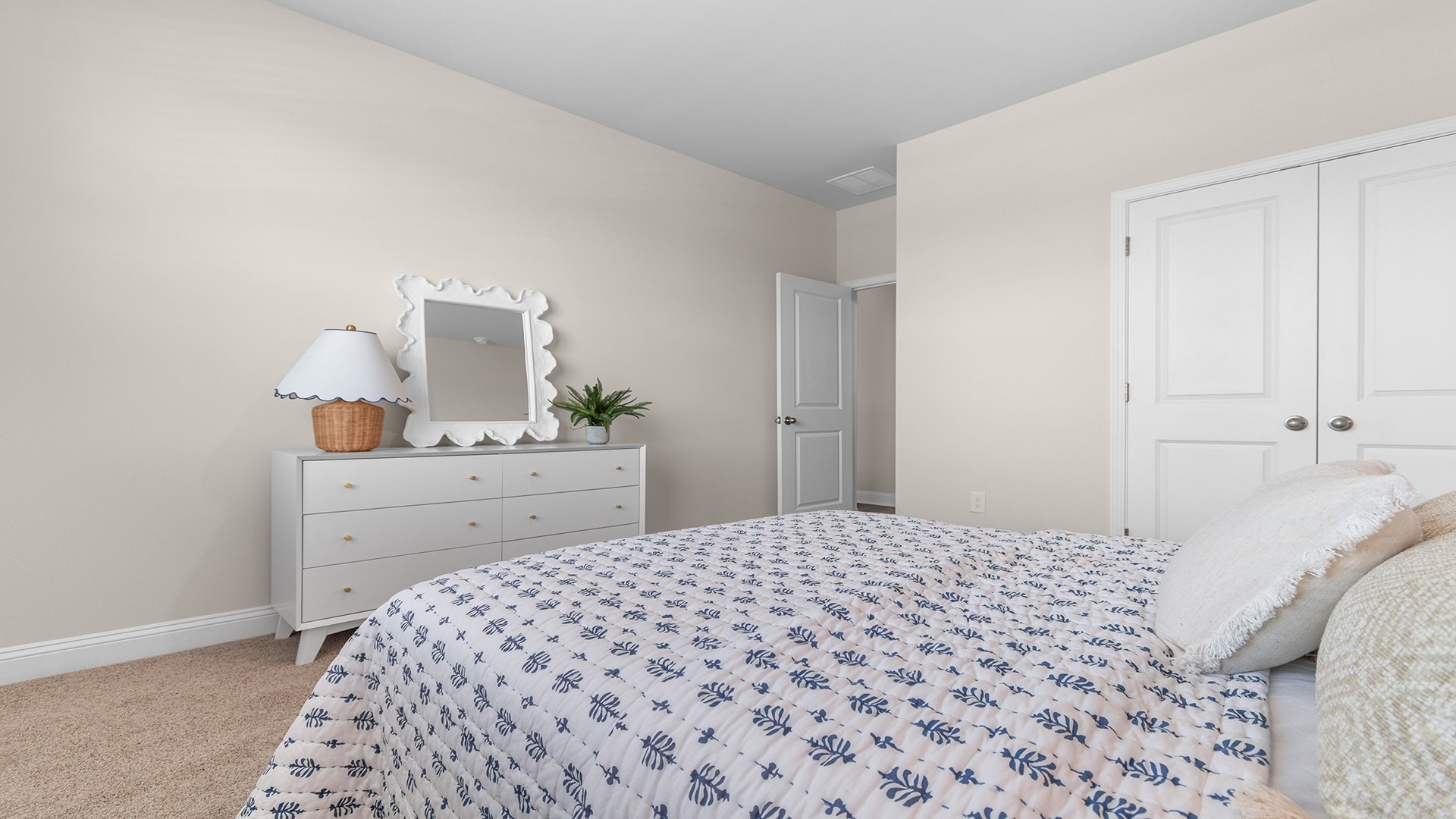 Bedroom with private closet and French closet doors
