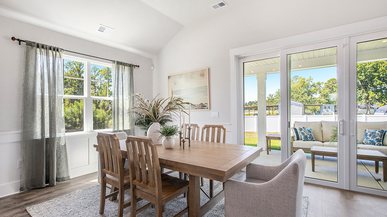Dining area with lots of natural light from several windows