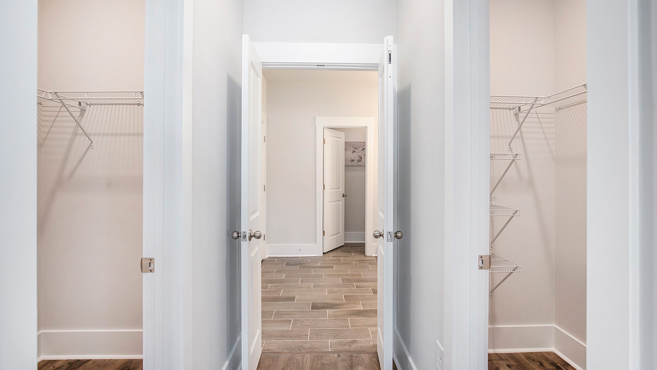 Double walk-in primary closets in the Litchfield Old Chapin Reserve Lexington, SC
