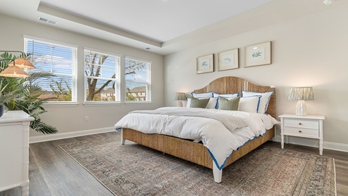 Primary bedroom with 3 large windows for light